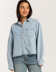 Rsq Denim Crop Shirt. Button Snap Front. Chest Pocket. Collared Neckline. Cuffed Long Sleeves. Hip Length. 100% Cotton. Hand Wash. Imported. Model Is Wearing A Size Small. Model Measurements:height: 5'7" Bust: 34"waist: 25"hips: 34.5" Denim Flares, Premium Denim, Soft Hand, Crop Shirt, Denim Shirt, Skirt Top, Recycled Cotton, Denim Wash, Sweater Jacket