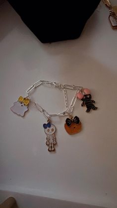 a bunch of charms that are on a table