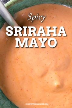 spicy sriraca mayo in a green bowl with a spoon on top and the words spicy sriraca mayo above it