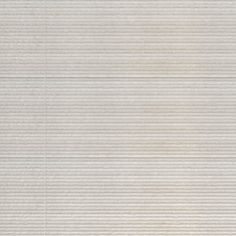 a white rug with vertical lines on it