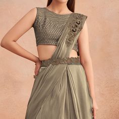 Grey & Gold colored stitched free size saree with belt is made from art silk fabric which is highlighted with sequins embroidered work as shown. comes along with sequins embroidered soft net blouse piece which you can customise as per your design/style. Occasion - You can wear this saree for parties, functions and events. Note:- the actual product may differ slightly in color and design from the one illustrated in the images when compared with computer or mobile screen. Festive Party Wear Pre-draped Embroidered Saree, Party Wear Art Silk Blouse Piece With Zari Work, Party Wear Art Silk Saree With Unstitched Blouse, Party Wear Pre-draped Saree With Resham Embroidery For Navratri, Party Wear Embroidered Pre-draped Saree For Festivals, Unstitched Art Silk Party Wear Blouse Piece, Unstitched Art Silk Blouse Piece For Party, Party Wear Unstitched Chanderi Blouse Piece, Unstitched Chanderi Blouse Piece For Party