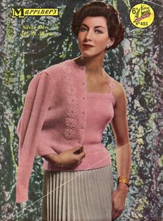 a woman in a pink sweater and pleated skirt on the cover of a magazine