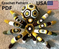 a crochet pattern is shown in the shape of a flower with eight petals