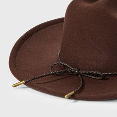 Add a timeless classic to your hat collection with this Western Hat from Universal Thread™. Made from midweight felt fabric in a solid color, this western-style hat features a dented crown and curved brim. Designed with an adjustable fit for comfortable wear, it adds a stylish finishing touch to a wide variety of outfits. Universal Thread™: Found exclusively at Target. Brown Western Wide Brim Hat, Western Brown Brimmed Hat, Brown Wool Western Hat, Brown Brimmed Western Hat, Brown Felt Hat For Rodeo, One Size, Straw Visor, Wide Brim Fedora, Visor Hats, Recycled Polyester Fabric