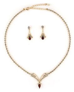 This jewelry set is stunning! It is encrusted with clear, sparkling rhinestones along a gold plate. The necklace measures approximately 15" long. The matching Earrings measure 1.0" long. It is perfect for weddings, proms, formals, parties, pageants, and more. It coordinates with any color or style wedding dress or formal ensemble. Gold Jewelry Sets With Diamond Accents And Crystal, Elegant Gold Jewelry Sets With Rhinestones, Gold Rhinestone Necklace In Costume Jewelry Style, Gold Rhinestone Necklace With Cubic Zirconia, Gold Cubic Zirconia Rhinestone Necklace In Costume Style, Gold Rhinestone Necklace In Cubic Zirconia Costume Jewelry Style, Gold Jewelry Sets With Diamond Accents For Parties, Gold Jewelry Sets With Rhinestones And Crystal, Gold Crystal Jewelry Sets With Rhinestones