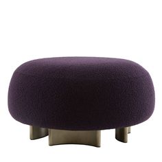 a purple ottoman sitting on top of a metal stand