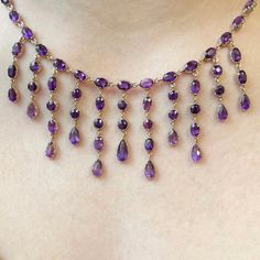 This pretty antique amethyst necklace features stones of a deep intense and bright purple.  The nine-carat yellow gold bezel set stones - in round, oval and pear shapes - have pinched edges holding them. These were commonly seen in the Victorian era and are reminiscent of Georgian cut-down settings.  The antique extension chain at the back was added later but makes the necklace an eminently wearable 17 inches, without taking away from the design.  FREE WORLDWIDE EXPRESS SHIPPING, TRACKED AND INS Purple Drop Necklace For Formal Occasions, Formal Purple Drop Necklace, Medieval Necklace, Pear Shapes, Shoulder Jewelry, Gold Necklace Indian, Necklace Indian, Purple Necklace, Amethyst Gold