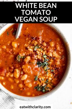 white bean and tomato soup in a bowl with text overlay that reads, white bean and tomato vegan soup