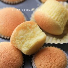 several cupcakes are sitting on top of each other in muffin tins