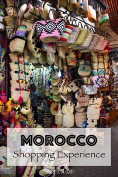 the morocco shopping experience is full of souvenirs, hats, and other things