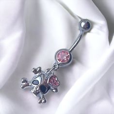 Super cute y2k 2000s silver pink punk goth chic dangling diamond rhinestone skull belly piercing ring bar.  Surgical steel  FREE STANDARD UK SHIPPING Silver Punk Body Jewelry For Gift, Silver Surgical Steel Belly Rings As Gift, Adjustable Silver Gothic Belly Rings, Silver Emo Jewelry For Valentine's Day, Silver Belly Rings For Valentine's Day, Valentine's Day Gift Silver Belly Rings, Pink Y2k Jewelry As Gift, Event Fits, Piercing Bar