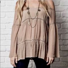 Cute Boho Cold-Shoulder Top By Umgee Usa. Size: Small (Runs Smallwill Fit And Tagged As An Xs) Color: Light Brown / Mocha Cold Shoulder Detail W/ Spaghetti Straps. Long Bell Sleeves. Bohemian, Peasant Style. Crocheted Pom Trim Detail. Lightweight And Flowy. 60% Cotton, 40% Polyester. Pit To Pit: 17” Length: 27” New Without Tags; Unworn Item. Smoke-Free Home. Casual Long Sleeve Off-shoulder Top For Beach, Beige Off-shoulder Tops For Fall, Bohemian Long Sleeve Off-shoulder Top For Vacation, Beige Off-shoulder Summer Tops, Casual Off-shoulder Top For Fall Brunch, Bohemian Long Sleeve Off-shoulder Top, Beige Off-shoulder Top For Day Out, Bohemian Off-shoulder Long Sleeve Top, Casual Cold Shoulder Tops For Brunch