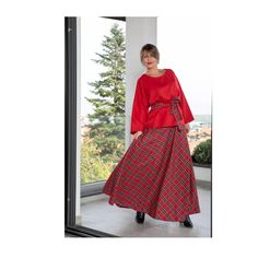 Get ready to sleigh this holiday season with our stunning red long flare plaid skirt and loose top Christmas outfit. This festive and fashion-forward ensemble is perfect for spreading holiday cheer while showcasing your unique style. The vibrant red plaid pattern brings a touch of traditional charm, while the long flare design adds a graceful and elegant touch. Paired with a loose-fitting top, this outfit is comfortable and allows for easy movement, making it ideal for all your holiday festiviti Women Suit Skirt, Suit Skirt Set, Red Christmas Outfit, Red Flare, Loose Tunic, Tartan Skirt, Womens Suits, Loose Top, Loose Fitting Tops