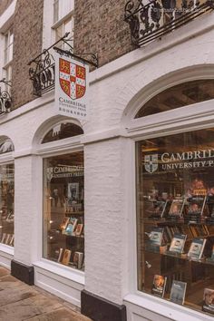 there are many books on display in the window