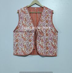 Beautiful Handmade Printed Cotton Fabric Quilted Winter Vest Embroidery Coat Quilted Vest Cotton Vest Handmade Reversible Coat, Three Layer Vest. This is a Gorgeous Piece Of Cotton block printed quilted vest jacket. It is one of a kind jacket and a unique piece. Measurements all different jackets . Small Size - Chest -38 inch Length- 20.5 inch Arm Hole- 23 Inch Medium Size - Chest-40 inch Length- 20.5 inch Arm Hole- 23 Inch Large Size - Chest- 42 Inch Length- 21 inch Arm Hole- 24 Inch Shoulder -17 inch XL Size - Chest -44 inch Length - 21 Inch Arm Hole- 25 Inch Shoulder-17 inch XXL size Chest- 46- inches Length -22 inches Arm Hole- 26 Inch Shoulder-18 inch Sleeves :- Sleeveless Closure :- String to close Note: Color may be vary due to camera flash light and different monitor settings. Cust Folk Style Cotton Outerwear For Spring, Red Folk Cotton Outerwear, Fitted Cotton Folk Outerwear, Folk Style Fitted Cotton Outerwear, Fitted Folk-style Cotton Outerwear, Multicolor Cotton Folk Outerwear, Multicolor Folk Style Cotton Outerwear, White Cotton Nehru Jacket For Spring, Multicolor Folk Cotton Outerwear