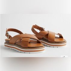 For Sale Is A Pair Of Nwt Torrid Flatform Crisscross Sandals In Size 10 Ww. They Are In Color Cognac Fit: Extra Wide Width (Ww): Our Unique Fit Gives You Extra Wide Width And Extra Room Around Your Whole Foot. Extra Cushioned Footbed. Materials + Care: Man-Made Materials. 100% Polyurethane. Imported. Details: Criss Cross Front Straps. Adjustable Ankle Strap. From Smoke And Pet Free Home If You Have Any Questions, Please Let Me Know. Thanks! Casual Brown Sandals With Cross Strap, Casual Brown Cross Strap Sandals, Casual Brown Cross-strap Sandals, Brown Synthetic Cross Strap Sandals, Brown Synthetic Sandals With Cross Strap, Criss Cross Sandals, Unique Fits, Flatform Sandals, Women's Shoes Sandals