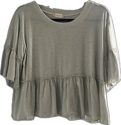 Casual Short Sleeve Top With Ruffle Hem, Green Crew Neck Top With Ruffles, Casual Crew Neck Top With Ruffle Hem, Green Top With Ruffle Hem And Sleeves, Flowy Short Sleeve Tops For Fall, Fall Short Sleeve Top With Ruffle Hem, Casual Ruffle Hem Tops For Fall, Summer Ruffled Relaxed Fit T-shirt, Summer Relaxed Fit Ruffled T-shirt