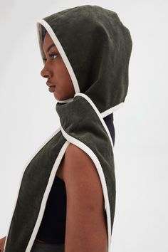 It’s the talk of the town, a 2nd time around. Our new hoody scarf will keep you warm and on trend this season. The scarf is connected to a hood – and our hood is connected to a scarf. And if you get bored with that, just reverse it to the other side - we’re giving you two looks in one! And, in this unique version, we’ve combined our dark green corduroy with white binding on one side and our blue checked cotton print on the other, reversible side. It’s all these details that make us distinctive a