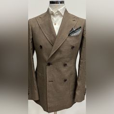 Brown 100% Loro Piana Fabric In Double Breasted Linen Suit Made In Italy. Patch Pocket 5 Inch Peak Lapel Double Stitched Double Vent On Suit Side Buckle On Flat Front Pant This Is Not A Tom Ford, Ralph Lauren, Enzo, Canali, Brunello Cucinelli, Gucci, Suitsupply, Kiton, Zegna, Brioni, Hugo Boss, Giorgio Armani, Dolce&Gabbana, Indochino, Ted Baker, Paul Paul Smith, Prada. But I Will Put This Suit Next To Any One Of Those Suits And It Will Come Out On Top Because Of The Value, Cut, Style And Fit. If It Does Not Exceed Your Expectations Return It For Refund. Double Breasted Linen Suit, Flat Front Pants, Linen Suit, Peak Lapel, Loro Piana, Paul Smith, Brunello Cucinelli, Giorgio Armani, Tom Ford