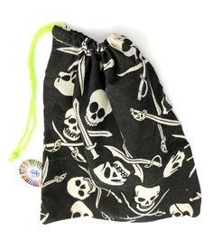 a drawstring bag with skulls and bones on it