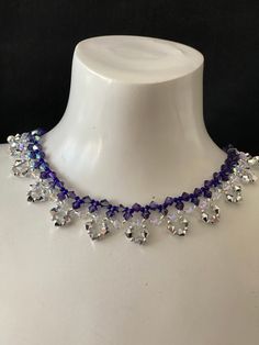 Crystal, Crystal choker, chic, women, crystal shimmer 2x, fashion, purple velvet ab, light comet silver 2x, luxury For this creation I used 4 mm bicones, seed beads and a stainless steel clasp without nickel. A sumptuous effect around the neck, very classy ... Width: 1.8 cm Length: 34 cm You can ask me the length you want. Material: crystal, rocailles, stainless steel clasp without nickel Crystal is the glass whose refractive index is equal or greater than 1.545. Unlike glass, crystal has more c Evening Crystal Necklace With Sparkling Stones, Evening Crystal Necklaces, Crystal Necklace For Evening, Party Crystal Beaded Necklaces, Iridescent Crystal Necklaces For Party, Purple Crystal Rhinestone Necklace For Party, Purple Crystal Necklaces For Party, Purple Beaded Crystal Necklaces For Party, Bling Crystal Choker Necklace