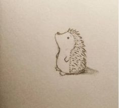 a drawing of a hedgehog sitting on the ground