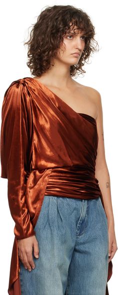 Viscose- and silk-blend velvet blouse. Draping and gathering throughout. · Asymmetric single-shoulder construction · Boning at side seam · Extended droptail hem · Zip closure at back · Non-slip band at interior · Partial silk satin lining Supplier color: Rust Blouse Draping, Orange Illustration, Asymmetric Blouse, Velvet Blouse, Asymmetrical Blouse, Velvet Blouses, Silk Satin, Apparel Accessories, Shirts Tops