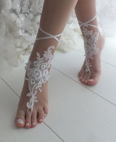 White barefoot sandals Lace barefoot sandals Bridal shoes | Etsy Bohemian White Barefoot Sandals For Beach Wedding, Handmade White Barefoot Sandals For Beach Wedding, Elegant White Handmade Barefoot Sandals, Elegant Handmade White Barefoot Sandals, Handmade White Anklets For Beach Wedding, Elegant White Adjustable Barefoot Sandals, Elegant Handmade Barefoot Sandals For Wedding, Elegant White Barefoot Sandals As Gift, Handmade Ankle Wrap Barefoot Sandals For Wedding