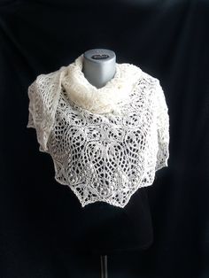 Lace shawl hand knitted from soft merino wool can be a lovely anniversary gift for wife, perfectly fits for Boho wedding -looks great around shoulders  and will warm you during a ceremony or a photo shoot in nature *Ivory shawl has depth 85 cm and length (neckline)- 172 cm ( 33.4/ 67.7 inches) *This shoulder wrap for all-year use -soft, lightweight and warm. *Different ways of wearing *100% hand knitted from soft merino wool *Washing instruction: gentle hand wash with warm water, Lay flat for th Bohemian Cream Knitted Shawl, Handmade Cream Shawl For Winter, Cream Hand Knitted Shawl For Winter, Winter Cream Hand Knitted Shawl, Bohemian Hand Knitted Shawl As Gift, Hand Knitted Shawl Gift For Winter, Hand Knitted Winter Shawl Gift, Hand Knitted Shawl As Winter Gift, Hand Knitted Shawl For Winter Gift