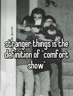 two people hugging each other with the text strange things is the definition of comfort show