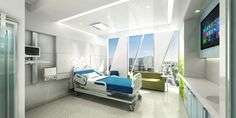 an empty hospital room with a bed and medical equipment