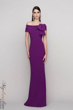 Looking for a show-stopping gown for your next big event? Look no further than the Frascara 4121. This gorgeous off-the-shoulder dress features a bow detail at the bodice and a fit and flare silhouette that is sure to turn heads. The hidden back zipper and satin lining make it both comfortable and chic. Made from 64% triacetate and 36% polyester, it's sure to be a favorite in your wardrobe. Elegant Evening Dress With Fitted Bodice And Boat Neck, Elegant Off-shoulder Mother Of The Bride Dress For Gala, Elegant Off-shoulder Evening Dress For Mother Of The Bride, Elegant Boat Neck Evening Dress For Gala, Elegant Boat Neck Gala Dress, Elegant Boat Neck Dress For Gala, Elegant Off Shoulder Dress With Straight Neckline For Gala, Boat Neck Gala Dress With Fitted Bodice, Boat Neck Evening Dress With Fitted Bodice