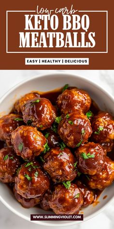 a bowl filled with meatballs covered in sauce and garnished with parsley