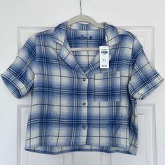 Nwt Hollister Blue Plaid Flannel Cropped Short Sleeve Sleep Pajama Pj Shirt Size Xs New With Tags/ Never Worn $25 Value (I Kept The Shorts From This Set. The Top Didn’t Fit Me) Blue And White Plaid Pattern Button-Down Short Sleeve Shirt Soft And Comfortable Material Thicker At The Ends Of Sleeves Front Pocket With Small Hollister Logo Boxy, Cropped Fit See Photos For Approximate Measurements Sleepwear, Intimates, Sleep Apparel, Pjs, Pj Set, Pajamas, Plaid Pajamas, Plaid Pjs, Button Down Sleep Sh Casual Collared Top For Pajama Party, Cotton Button-up Tops For Pajama Party, Casual Button-up Sleep Tops, Blue Collared Cotton Sleepwear, Blue Collared Shirt For Loungewear, Casual Cotton Sleep Shirt, Blue Relaxed Fit Top For Pajama Party, Casual Blue Tops For Pajama Party, Pajamas Plaid