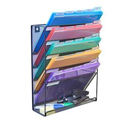 a stack of files and folders in a metal holder with the words 25 th cut pocket files below it