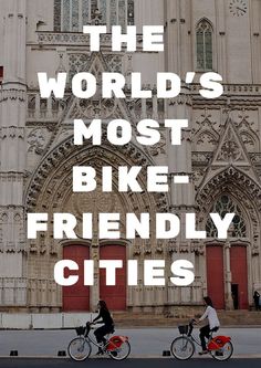 two people riding bikes in front of a large building with the words, the world's most bike friendly cities