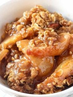 a close up of a bowl of food on a table