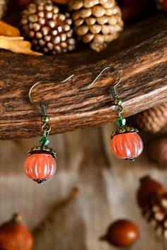 Dainty little pumpkins drop dangles earrings are super cute and trendy.  Made of alloy with fish hook hypoallergenic wires and rubber push backs for security. Little rustic Autumn earrings are simply perfect for the Holiday Season. Pumpkin Bead, Pumpkin Earrings, Fall Earrings, Pumpkin Orange, Beaded Earrings, Favorite Jewelry, Jewelry Earrings Dangle, Dangle Drop Earrings, Dangle Earrings