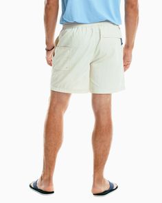 Our famous Shoreline shorts were made for versatility and comfort thanks to the elastic waistband. These men's nylon shorts are designed with anti-chlorine and seawater fabric, as well as a side pocket with thread eyelet for drainage. Style: 8607 6-inch inseam Model is 6'2 with a 32" waist wearing size M 100% Recycled Nylon Water resistant with anti-chlorine and seawater fabric Back right hand pocket with low-profile zipper for seated comfort Elastic waistband with ST boat rope drawcord Self fab Preppy Boys Outfits, Boat Rope, Water Fabric, Preppy Boys, Nylon Shorts, Men Closet, Sophisticated Dress, Sea Water, Cute Swimsuits