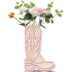 a pink cowboy boot with flowers in it