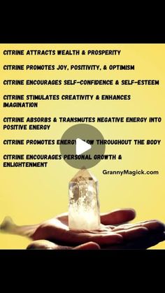 a hand holding an ice cube in front of a yellow background with the words online attracts health & prosperity