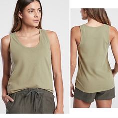 Nwt Athleta Organic Daily Tank Color: Shadow Olive Size: 1x New With Tags. No Marks, Odors, Flaws, Or Defects. Lightweight Organic Cotton Is Stretchy And Soft. The Scoop Neckline Flatters Your Form. Organic Cotton. Sustainable Easy Care Machine Wash And Dry. Skims Easily Over The Body. Body Length In 1x Plus: 25", Armpit To Armpit 21.5" Smoke/Fragrance/Dust-Free Home. Bundle Items To Receive Discounts And One Shipping Fee! Green Casual Tank Top For Workout, Summer Tank Activewear, Summer Tank Activewear For Everyday, Casual Scoop Neck Sports Top, Casual Green Racerback Top, Casual Tank Tops For Gym, Green Athleisure Tops For Everyday, Casual Scoop Neck Activewear For Workout, Casual Green Tank Activewear