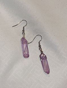 Handmade simplistic single amethyst earrings. Nickel free and do not cause discoloration. Minimalist Purple Earrings With Ear Wire, Purple Crystal Earrings With Ear Wire As Gift, Purple Minimalist Earrings For Pierced Ears, Purple Minimalist Pierced Earrings, Purple Drop Crystal Earrings Nickel Free, Nickel Free Purple Crystal Drop Earrings, Purple Pierced Crystal Earrings As Gift, Handmade Minimalist Purple Earrings, Minimalist Purple Earrings