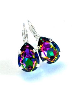 "Teardrop Crystal Earrings  - 14mm pear crystal stones in Medium Vitrail, Rainbow  - High Quality, anti-tarnish, silver plated brass lever back settings  - Handmade in SoCal  - Free gift wrapping  - Free Shipping*  - Earring length: 1\" inch * NOTE: This is a great time to send gifts to your loved ones. I can ship (Free Shipping ) directly to them within the Continental US. Including free gift wrapping and your personalized note." Crystal Stones, Send Gift, The Continental, Free Gift Wrapping, Teardrop Earrings, Pear Shaped, Crystal Earrings, Earrings Handmade, Beautiful Earrings