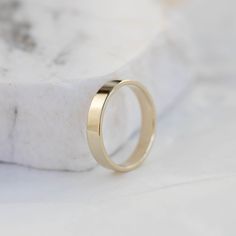 Mens Gold Ring, Mens Wedding Band, Men Wedding Band, Simple Wedding Band, Gold Wedding Band, Stacking Gold Ring, His and Hers, Flat Wedding Band A classic ring made of 14k solid gold with softened edges for comfort. Engrave the ring with no extra cost. High polished wedding band. 100% handcrafted with love! D E T A I L S ● Metal: 14K Solid Gold, 14K White Gold, 14K Rose Gold ● Finish: High polished or matte ● Dimensions: measures 3.7 mm in width x 1.2mm thick R I N G ∙ S I Z I N G For General Re Polished Finish Wedding Rings With Thick Band, Wedding Thick Band Ring In 14k Gold, Yellow Gold Thick Band Couple Rings For Wedding, 14k Gold Thick Band For Wedding, Yellow Gold Thick Band Wedding Couple Rings, 14k Gold Wedding Band With Thick Shape, Wedding Couple Rings Yellow Gold Thick Band, White Gold Thick Band For Wedding, Classic Thick Band Couple Rings For Wedding