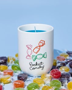 sweet scented candle with 'pocket candy' across the front surrounded by wrapped candy Candy Candle, Fruit Scent, Sweet Fruit, Ceramic Vessel, Hard Candy, Scented Wax, Knitted Blankets, Make Sense, Candle Making