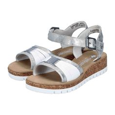 Rieker FSK Women's Sandals - Silver Rieker FSK Women's Sandals - Silver Upgrade your summer style with these Rieker FSK Women's Sandals. Crafted from durable synthetic leather, these sandals combine fashion and comfort seamlessly. The wedge heel design provides both elegance and stability, making them perfect for all-day wear. The PU sole ensures long-lasting quality, while the textile inner material adds a soft touch to your feet. Say goodbye to dust and dirt effortlessly with a gentle shoe brush or a damp cloth. Step out in style and comfort with these silver sandals from Rieker. Silver Round Toe Synthetic Sandals, Silver Closed-toe Synthetic Sandals, Silver Leather Wedge Sandals For Summer, Silver Closed Toe Synthetic Sandals, Silver Synthetic Wedge Sandals For Summer, Silver Synthetic Wedge Sandals With Round Toe, Silver Synthetic Round Toe Wedge Sandals, Silver Leather Wedge Sandals For Beach, Casual Silver Wedge Sandals For Summer