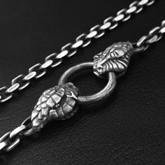 Snake Necklace, stylish, and symbolic--the 925 Silver snake necklace is a stunning piece of jewelry that has captivated fashion enthusiasts and symbol aficionados alike. Dive into the world of this versatile accessory that blends elegance with a touch of mystique. ●Material: International standard 92.5% Sterling Silver ●Size: 500-700mm ,width:4.5mm.   weight:50g  ●Handmade, The one and only. ●High Quality Guaranteed ●Suitable for all kinds of festivals ●Exquisite gift box&Perfect Gift There is n Symbolic Round Pendant Necklace, Silver Snake Necklace With Symbolic Style, Silver Symbolic Snake-shaped Necklace, Sterling Silver Engraved Snake Jewelry, Symbolic Sterling Silver Snake Chain Necklace, Symbolic Sterling Silver Snake Jewelry, Symbolic Snake-shaped Sterling Silver Jewelry, Symbolic Pendant Necklace With Sterling Silver Clasp, Engraved Sterling Silver Snake Jewelry