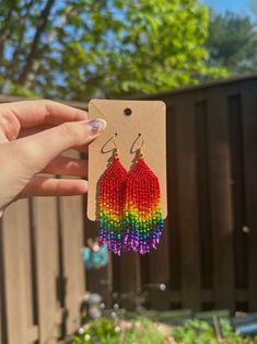 A pair of rainbow beaded tassel earrings! Pierced and clip-on styles available. They are lightweight, ensuring hours of comfortable wear without compromising on style. ♥ Hypoallergenic. Nickel-Free and Lead-Free. 🌈 Rainbow Earrings Measurements & Weight: - 7cm drop length, 2.5cm wide - Beads are 0.2cm thick - Each earring weighs 5g ♥ Handcrafted With: ✔ High-quality Czech glass seed beads ✔ Strong bead weaving thread ✔ Plated sterling silver Thank you for visiting! If you have any questions, fe Cheap Rainbow Beaded Dangling Earrings, Rainbow Beaded Earrings With Ear Wire, Rainbow Earrings With Colorful Round Beads, Rainbow Dangle Tassel Earrings Gift, Rainbow Dangle Earrings With Tiny Beads, Rainbow Dangle Jewelry With Tiny Beads, Rainbow Earrings With Colorful Beads, Multicolor Beaded Drop Clip-on Earrings, Multicolor Beaded Clip-on Drop Earrings