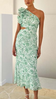 Make a statement with this green floral one-shoulder cutout maxi dress. Featuring elegant frill detailing, a chic side cutout, and a flattering invisible zip, it’s perfect for any occasion. Spring Evening One-shoulder Dress With Cutout, Spring One-shoulder Cutout Midi Dress, Feminine One-shoulder Floral Maxi Dress, Chic Green Cutout Midi Dress, Luxury One-shoulder Floral Print Maxi Dress, Cutout Maxi Dress, Swimwear Cover, Hoodie Top, Sweater Jacket